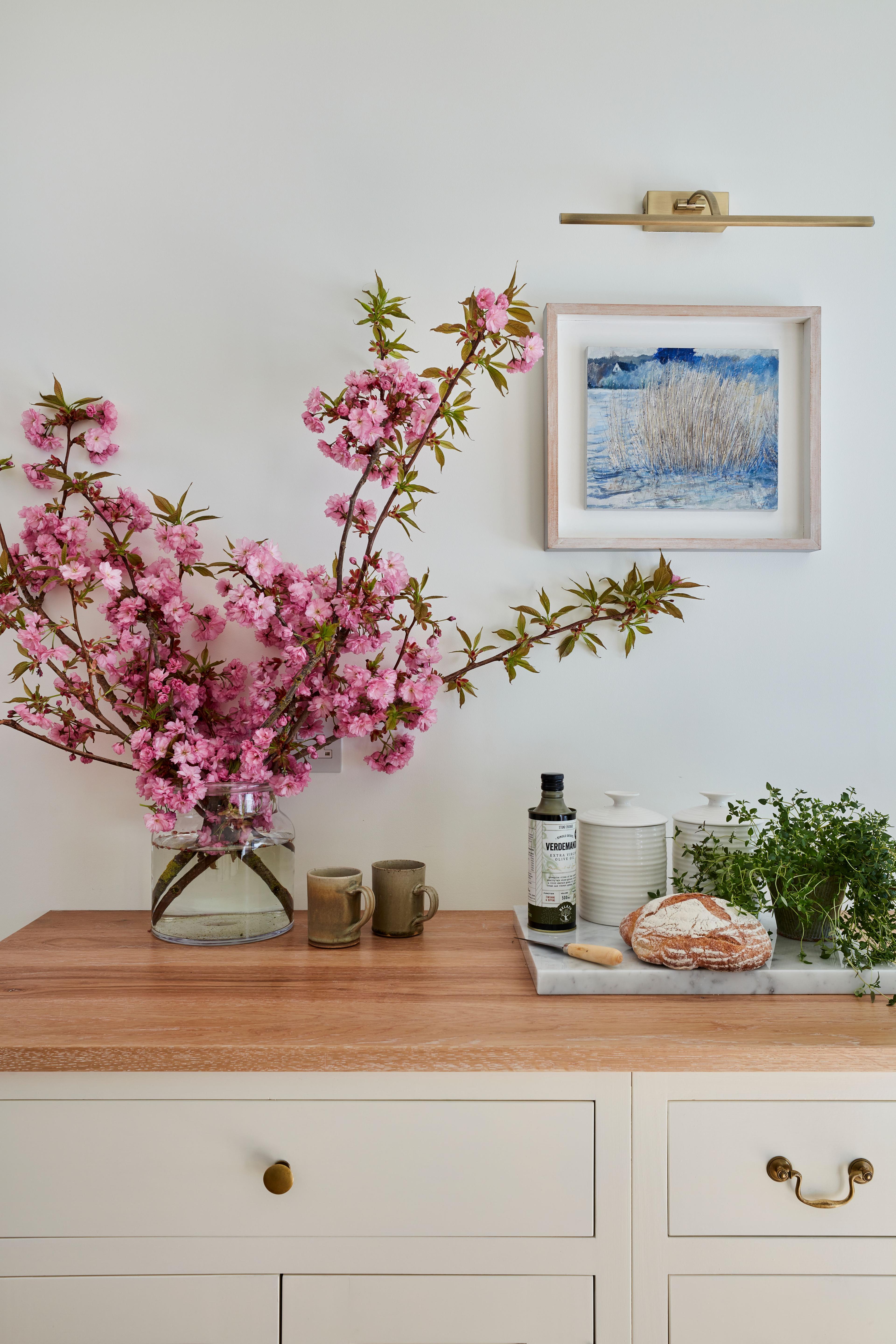 This neglected 1920s house was transformed by calming colours, elegant fixtures and clever use of light.