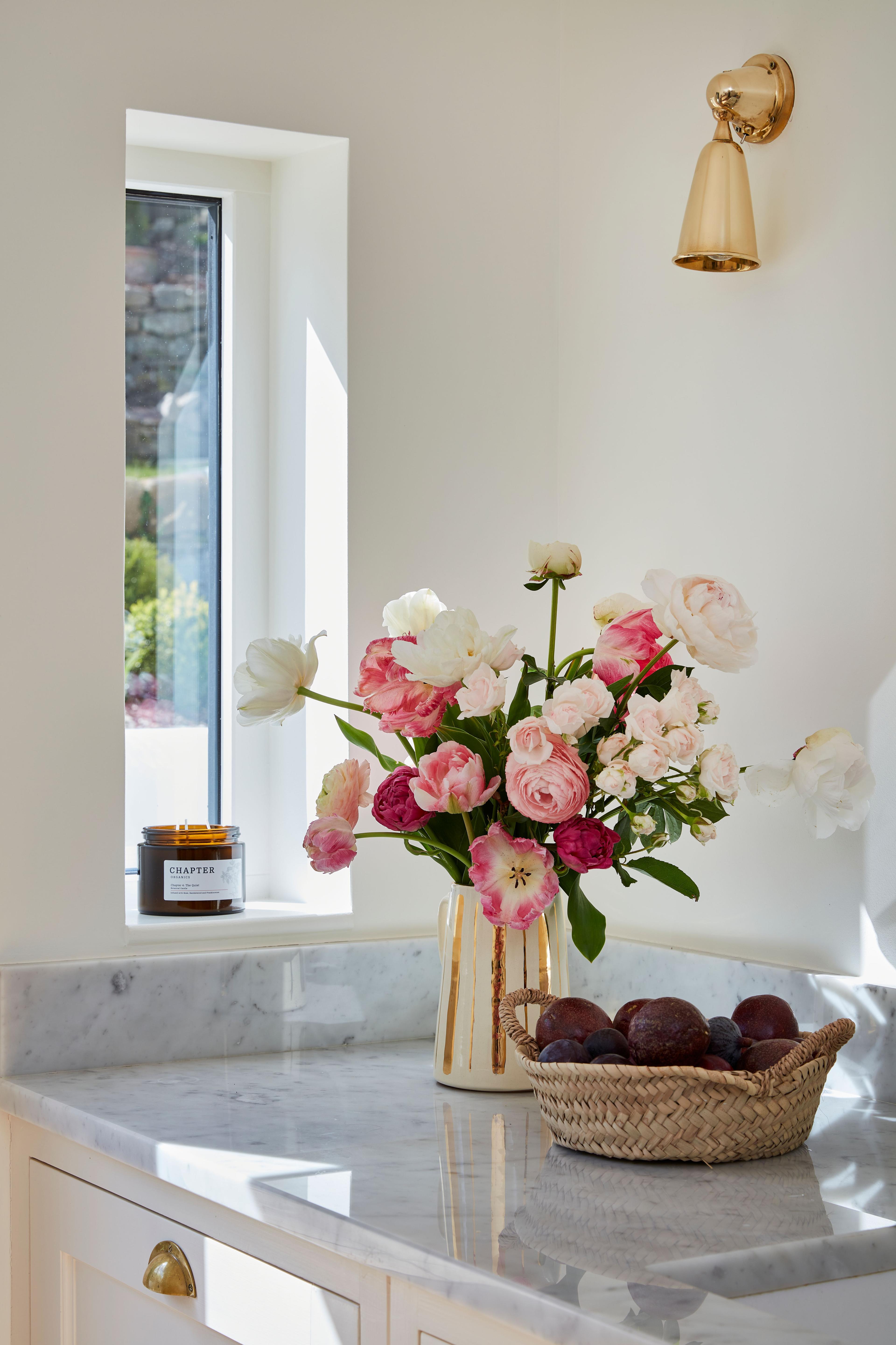 This neglected 1920s house was transformed by calming colours, elegant fixtures and clever use of light.