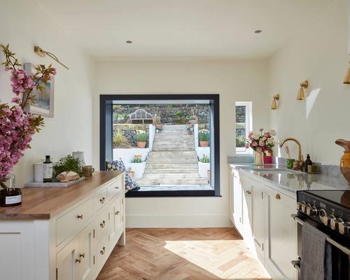 This neglected 1920s house was transformed by calming colours, elegant fixtures and clever use of light.