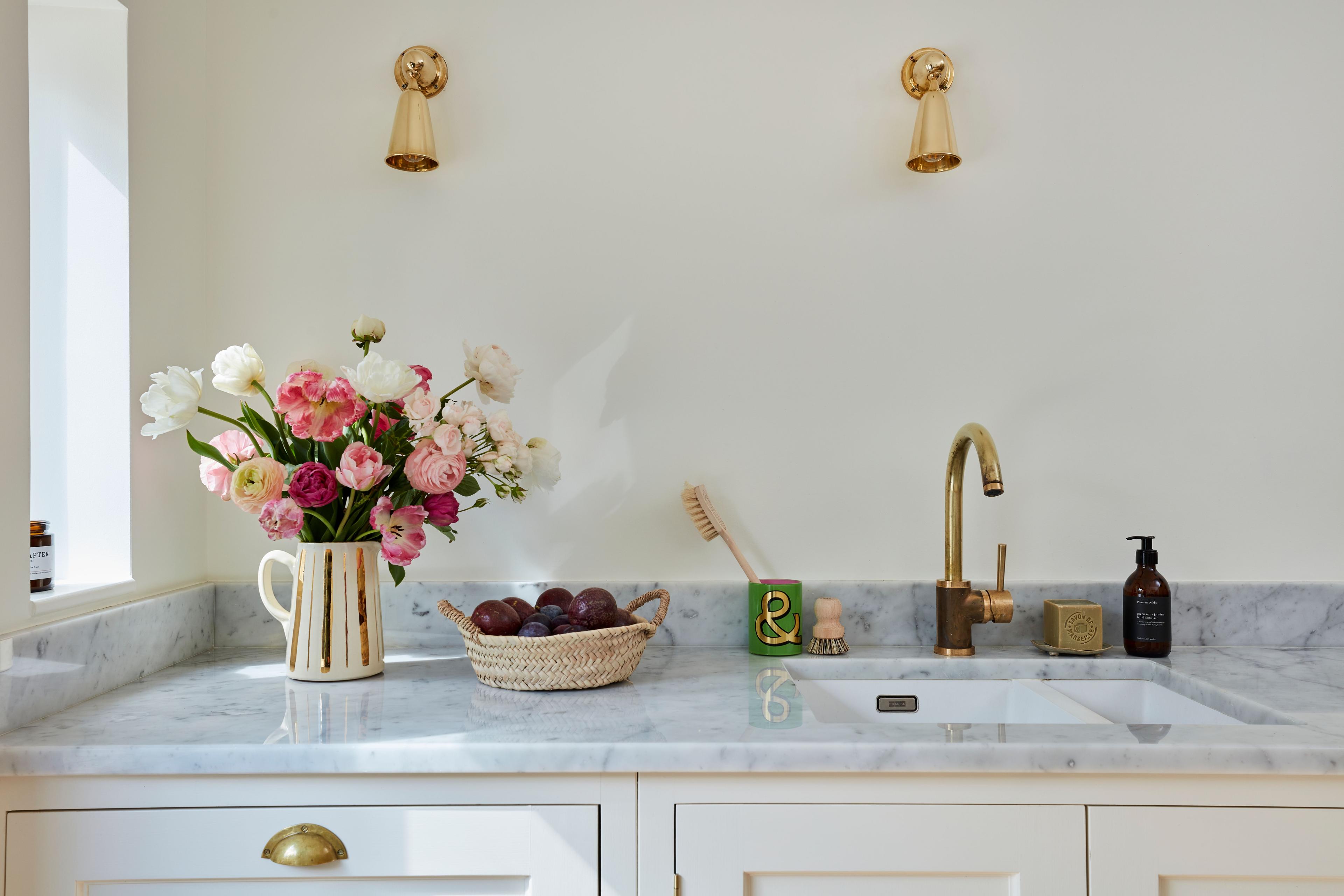 This neglected 1920s house was transformed by calming colours, elegant fixtures and clever use of light.